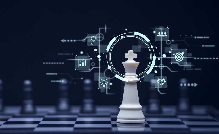 A cyber-focused image of a chessboard displaying business strategy