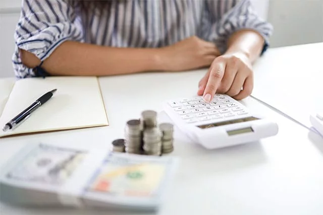 Woman making calculations