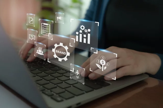 Hands using a laptop to transform their business