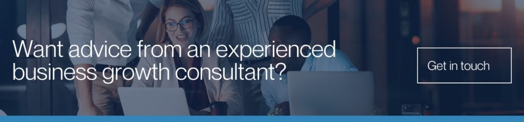 want advice from an experienced business growth consultant: Business team collaborating around laptops with banner text asking for advice from an experienced business growth consultant and contact call-to-action.